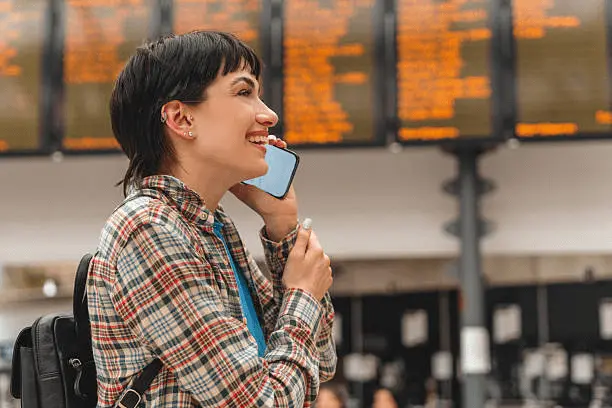 a woman using past perfect tense in a call