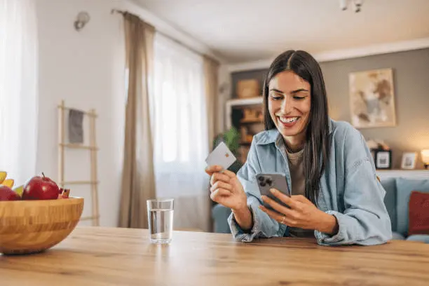 image of a girl texting a message using prepositional verb